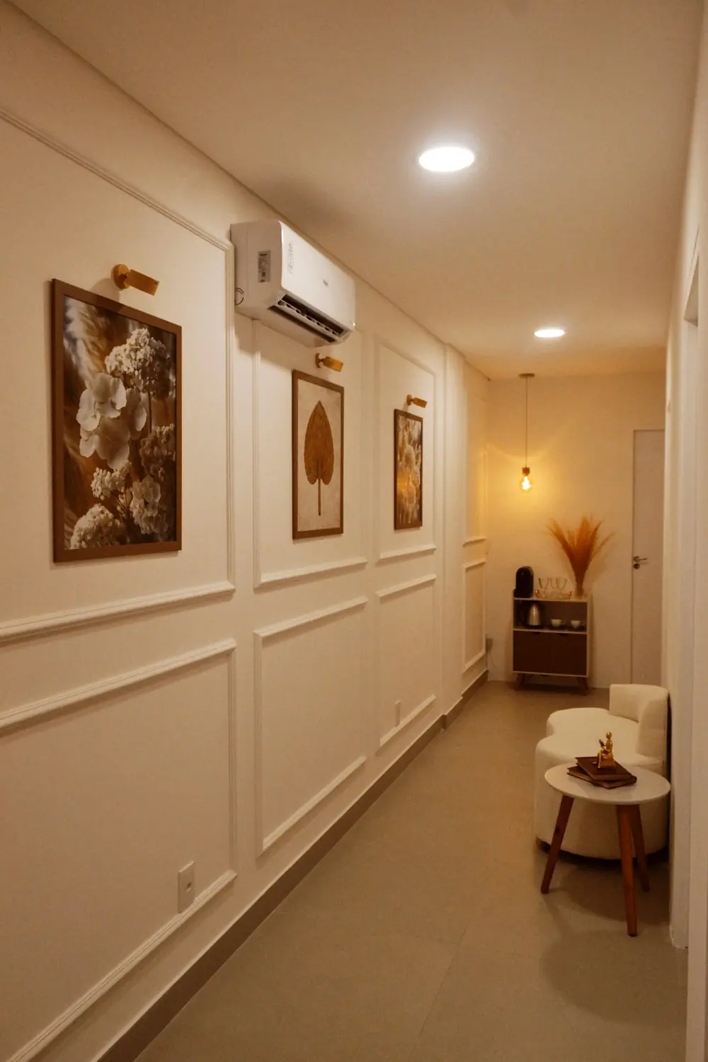 The quiet, warmly lit waiting corridor of the private rooms