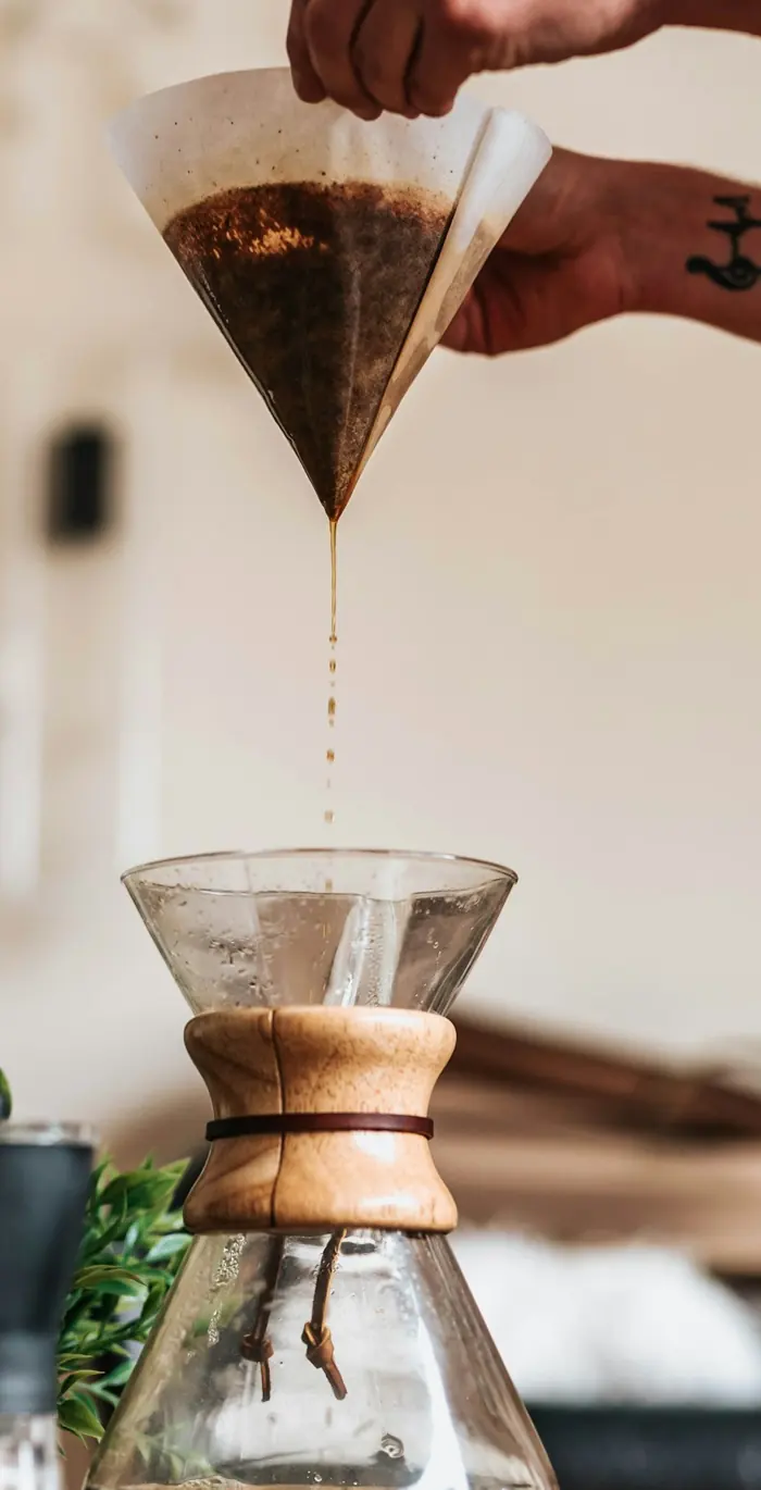 Filter coffee dripping into a glass brewer