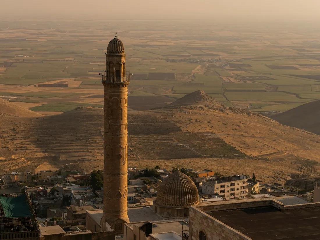 The minaret of the Great Mosque of Mardin above the Mesopotamian plain