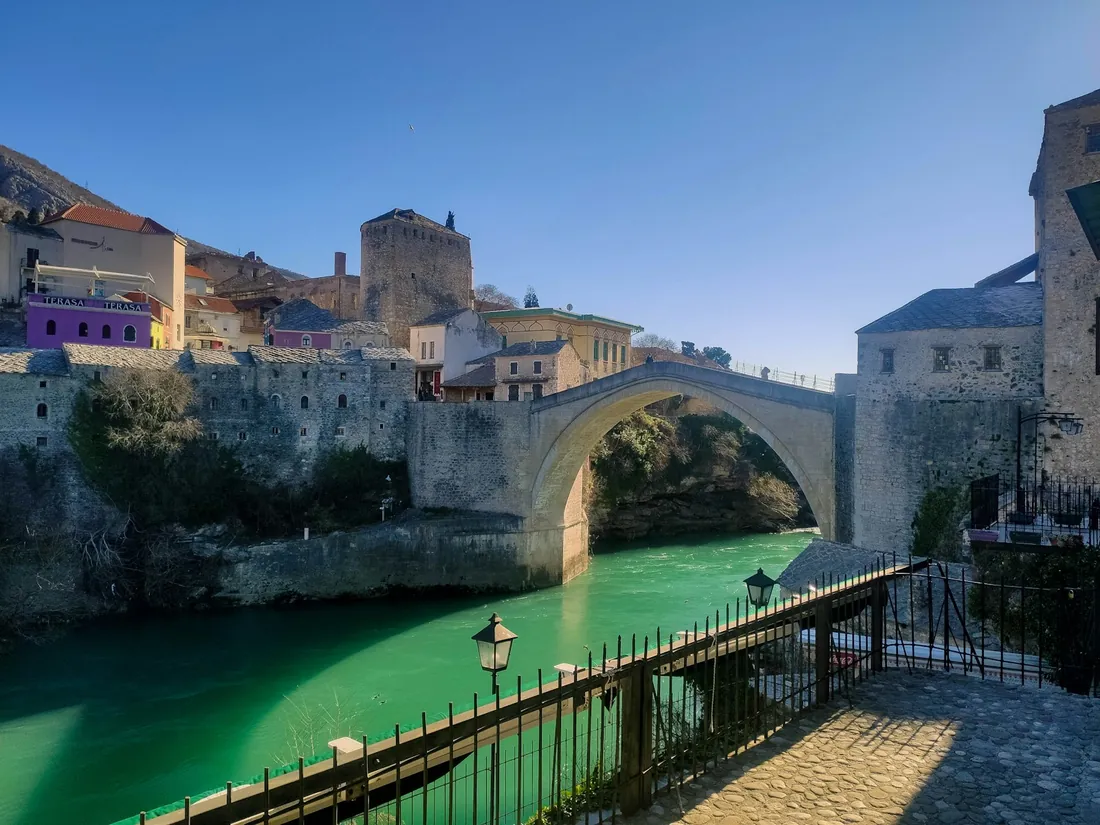 The Old Bridge of Mostar over the green Neretva river
